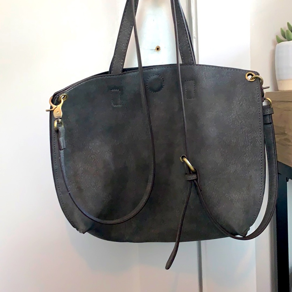 Vegan leather with adjustable strap/pouch inside